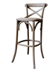 Wooden bar stool with wicker seat and white washed detail.