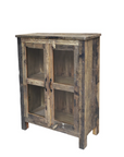 Reclaimed wooden cabinet with glass doors.