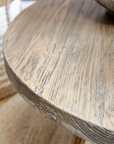 Round Wooden Coffee Table, close up.