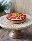 Wooden Cake Stand with strawberry tart.