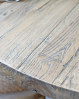 A detailed shot of the Round wood dining table.