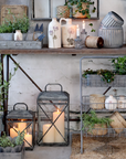 Garden room with rustic lanterns and plants