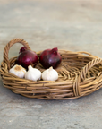 Round Basket Tray with red onions and garlic.