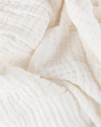 White Muslin Bedspread close up detail.