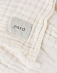 White Muslin Bedspread with yard woven label.