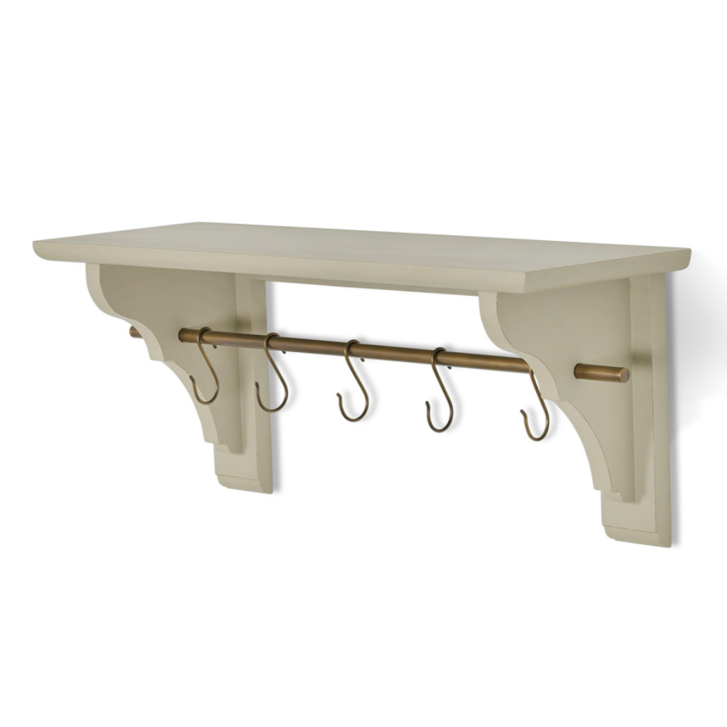 Clay coloured wooden shelf with brass shelf and hooks