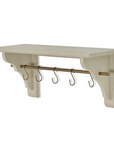 Clay coloured wooden shelf with brass shelf and hooks