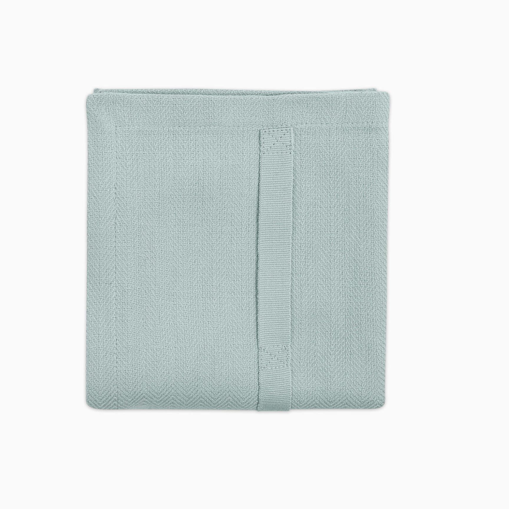 Sky blue kitchen towel folded up into small square.