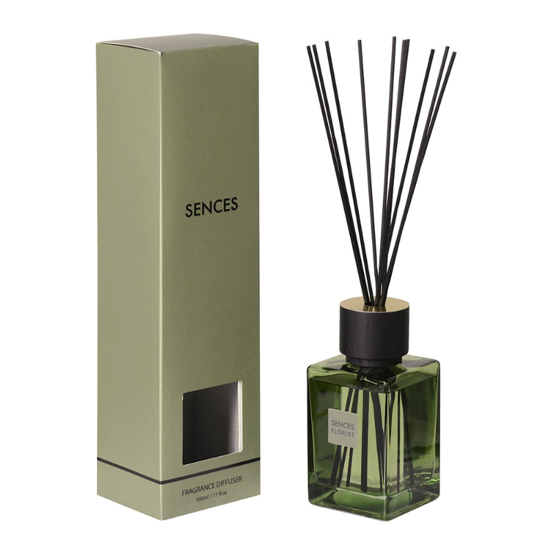 Sences Florist Reed Diffuser in green bottle against white background.