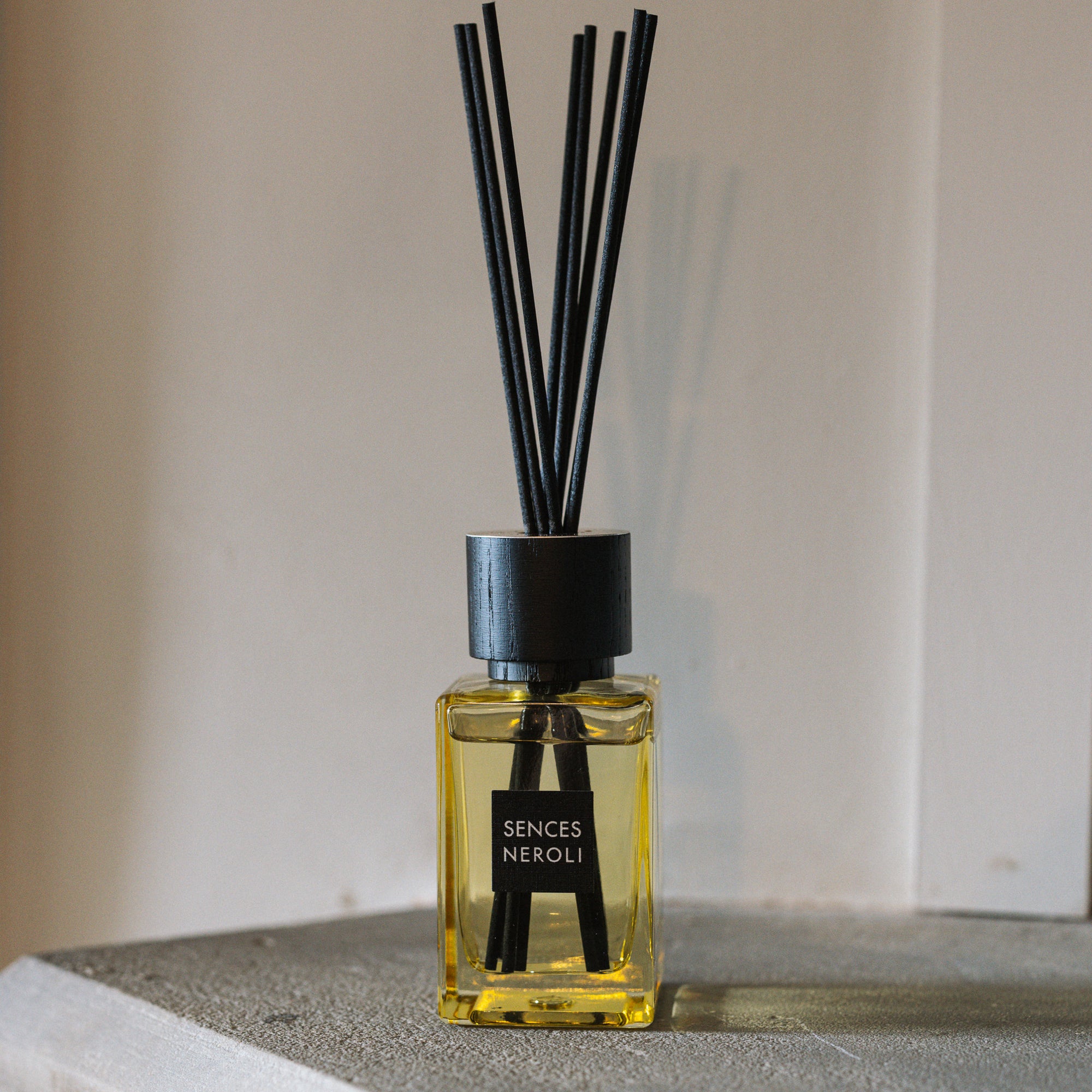 Sences Neroli Mini Reed Diffuser with stone mantle.