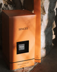 orange presentation box for large Sences diffuser on stone hearth.