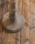 Bamboo look wooden floor lamp base on wooden floor. 