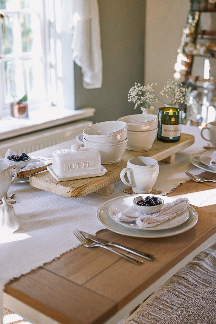 wooden table with ceramic crockery.